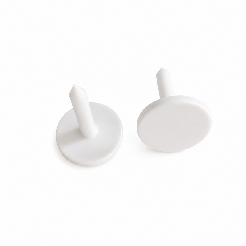 Two UCODE 7 RFID nail tags shown from side and angled views